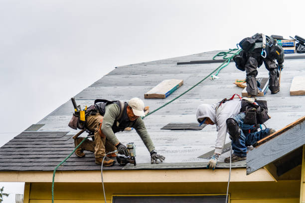 Professional Gutter Installation technician working in Glen Head, NY